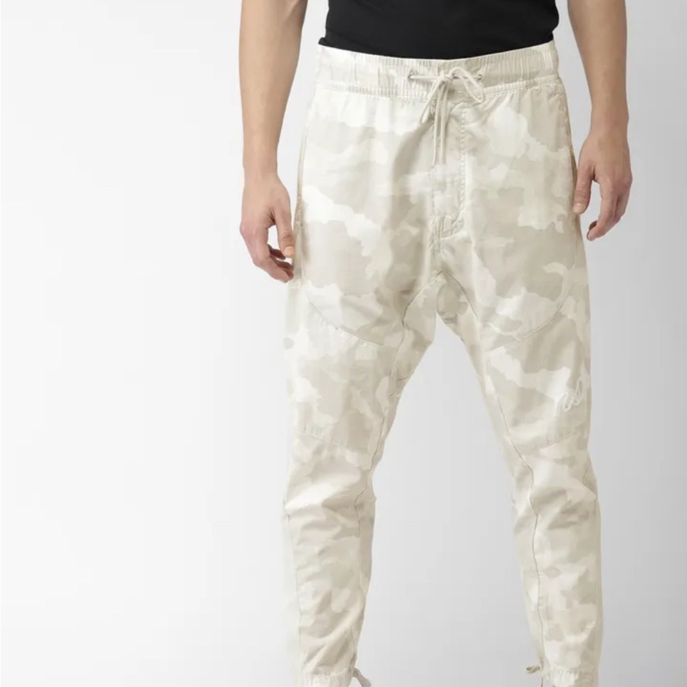 Nike Sportswear NSW Woven Camo Joggers in a gray & white camouflage print Small